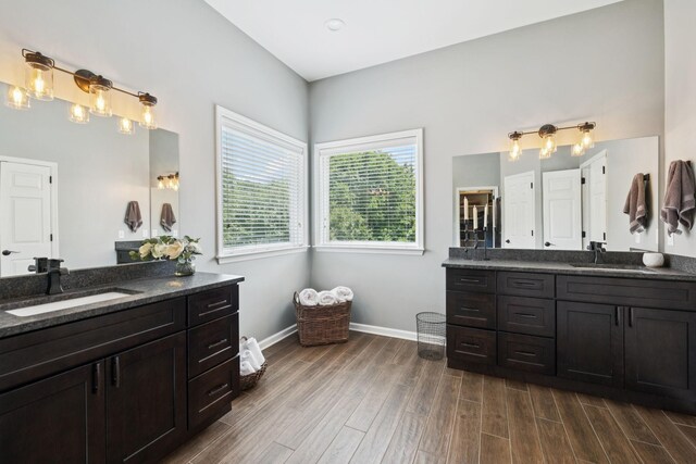 119 Abercairn Dr, Franklin, TN 37064 - full bath featuring wood finished floors, two vanities, and baseboards