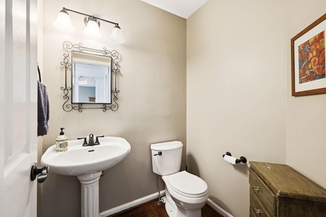 119 Abercairn Dr, Franklin, TN 37064 - bathroom with toilet, wood finished floors, and baseboards