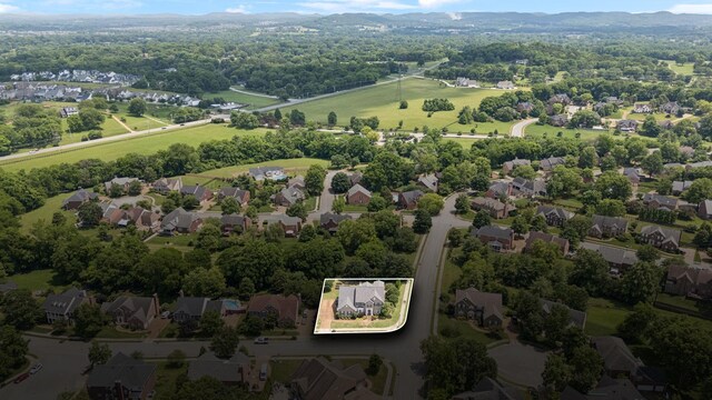 119 Abercairn Dr, Franklin, TN 37064 - aerial view of property and surrounding area with property boundaries highlighted and nearby suburban area