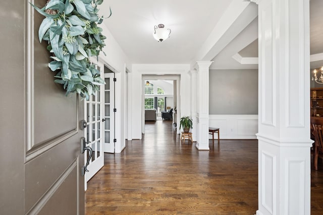 119 Abercairn Dr, Franklin, TN 37064 - entryway with decorative columns, wainscoting, a decorative wall, and wood finished floors