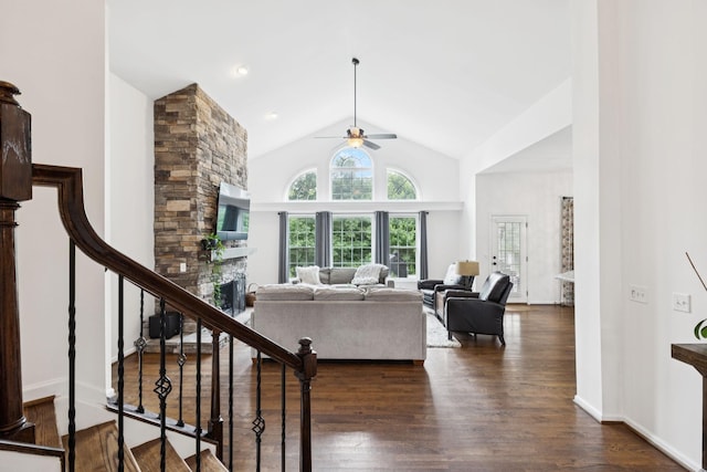 119 Abercairn Dr, Franklin, TN 37064 - living area with a ceiling fan, a fireplace, dark wood-style flooring, stairs, and high vaulted ceiling