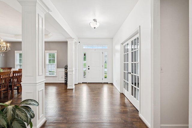 119 Abercairn Dr, Franklin, TN 37064 - foyer with decorative columns, dark wood-type flooring, and a chandelier