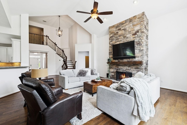 119 Abercairn Dr, Franklin, TN 37064 - living area with a ceiling fan, dark wood finished floors, high vaulted ceiling, and a stone fireplace