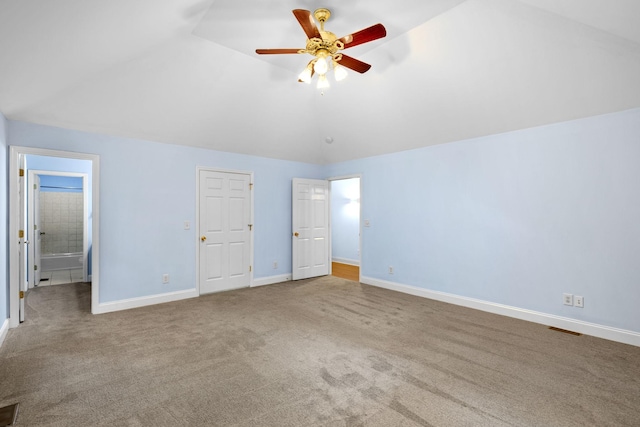 2520 Johnson Ridge Rd, Antioch, TN 37013 - unfurnished bedroom with vaulted ceiling, carpet flooring, baseboards, ensuite bath, and a ceiling fan