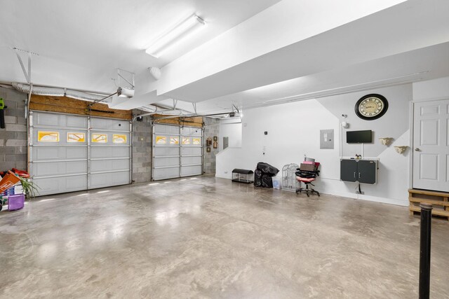 2520 Johnson Ridge Rd, Antioch, TN 37013 - garage with electric panel and a garage door opener