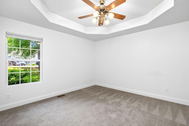 2520 Johnson Ridge Rd, Antioch, TN 37013 - empty room with carpet, baseboards, a tray ceiling, and a ceiling fan