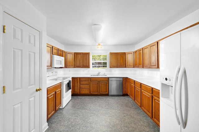 2520 Johnson Ridge Rd, Antioch, TN 37013 - kitchen with white appliances, a sink, brown cabinets, and light countertops