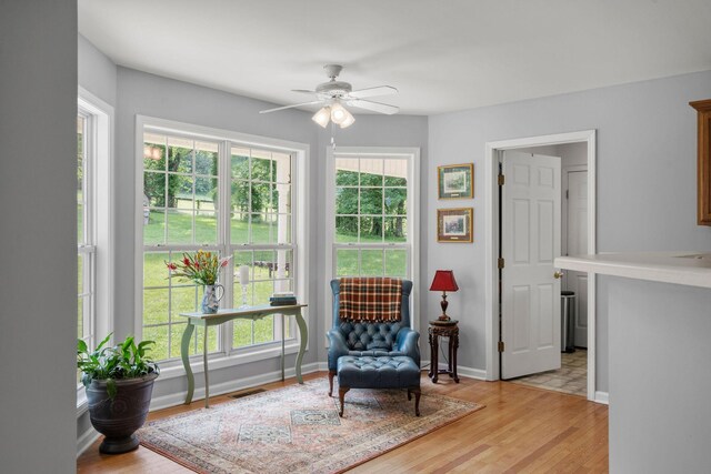 4291 Skelley Rd, Santa Fe, TN 38482 - living area featuring ceiling fan, light wood-style floors, and baseboards