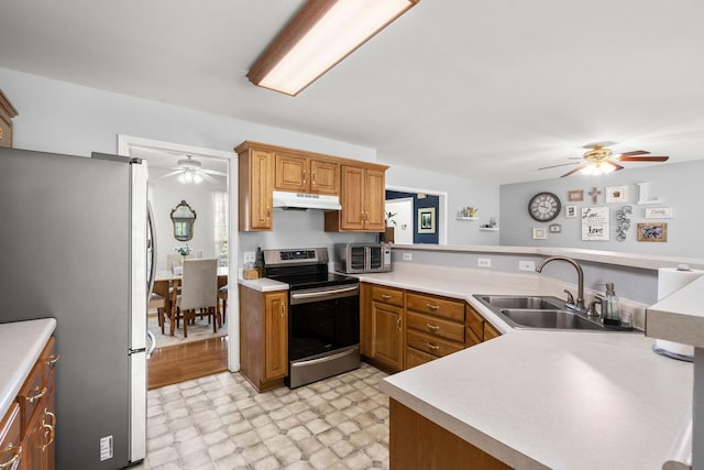 4291 Skelley Rd, Santa Fe, TN 38482 - kitchen featuring appliances with stainless steel finishes, under cabinet range hood, ceiling fan, and a sink
