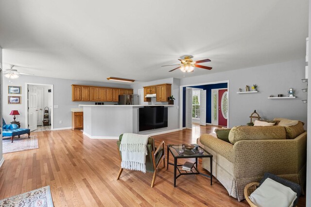 4291 Skelley Rd, Santa Fe, TN 38482 - living room with ceiling fan, light wood-type flooring, and baseboards
