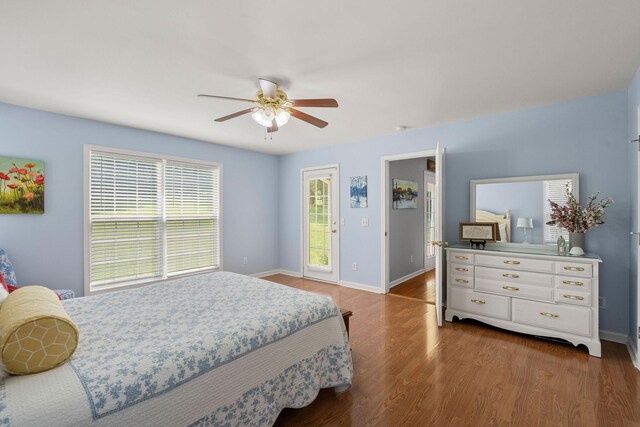 4291 Skelley Rd, Santa Fe, TN 38482 - bedroom with wood finished floors, baseboards, and a ceiling fan