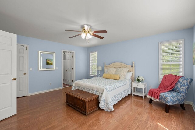 4291 Skelley Rd, Santa Fe, TN 38482 - bedroom featuring wood finished floors, baseboards, and ceiling fan