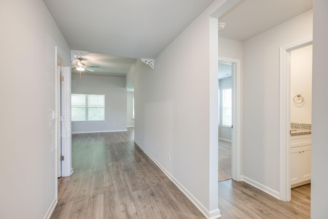 1003 Autumnwood Dr, Dickson, TN 37055 - corridor featuring light wood-style floors and baseboards