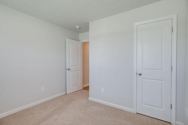 1003 Autumnwood Dr, Dickson, TN 37055 - unfurnished bedroom with light carpet and baseboards