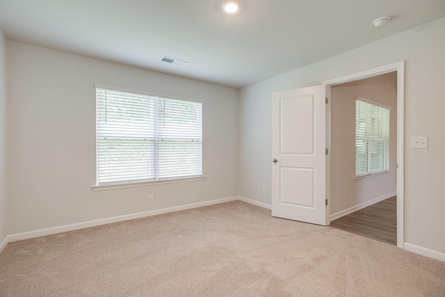 1003 Autumnwood Dr, Dickson, TN 37055 - carpeted empty room featuring a smoke detector and baseboards