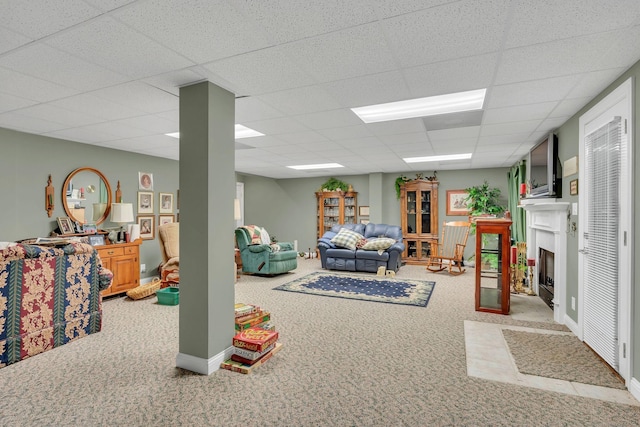 4090 Ironwood Dr, Greenbrier, TN 37073 - below grade area featuring carpet flooring, a drop ceiling, and a fireplace