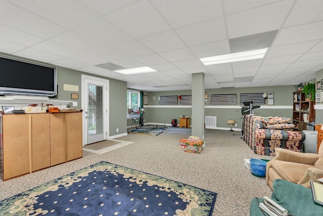 4090 Ironwood Dr, Greenbrier, TN 37073 - living room featuring carpet, baseboards, and a drop ceiling