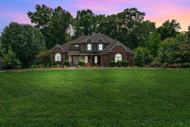 4090 Ironwood Dr, Greenbrier, TN 37073 - view of front of home featuring a lawn and brick siding