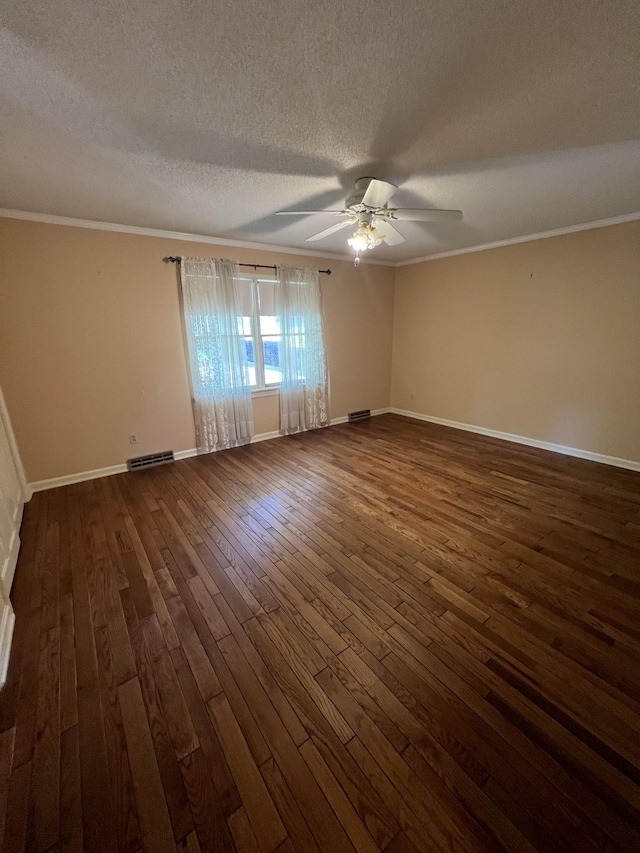 212 N 3rd St, Pulaski, TN 38478 - spare room with dark wood-style flooring, a textured ceiling, ornamental molding, ceiling fan, and baseboards