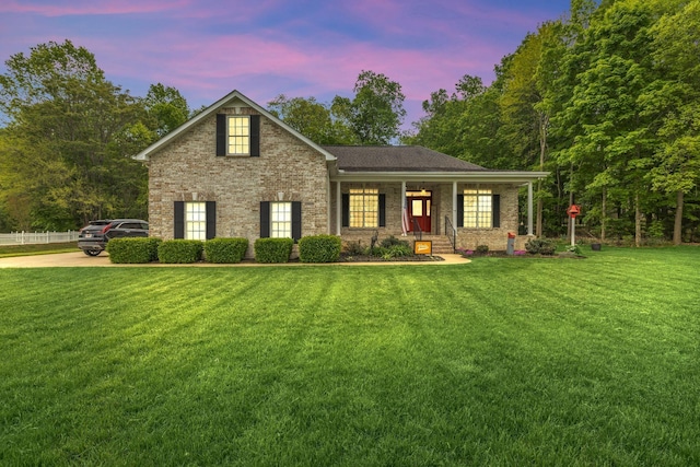 3906 Rowland Rd, Murfreesboro, TN 37128 - view of front facade featuring a front yard, brick siding, and a porch