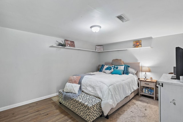 1618 Woodside Dr, Lebanon, TN 37087 - bedroom with baseboards and wood finished floors