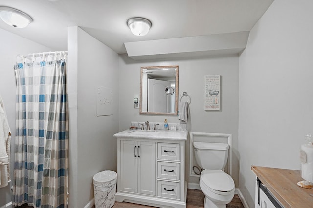 1618 Woodside Dr, Lebanon, TN 37087 - full bathroom featuring vanity, toilet, baseboards, wood finished floors, and a shower with curtain