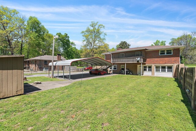 1618 Woodside Dr, Lebanon, TN 37087 - view of grassy yard with a carport and driveway
