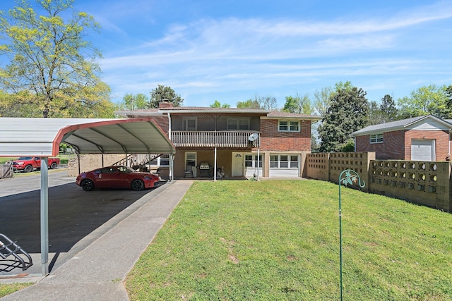 1618 Woodside Dr, Lebanon, TN 37087 - view of front of home featuring a detached carport, driveway, a balcony, and a chimney