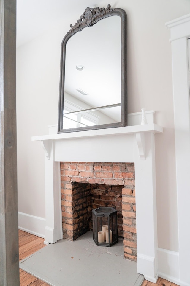 205 College St, Portland, TN 37148 - detailed view of baseboards and wood finished floors