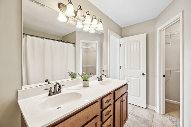 4219 Zephyr Ct, Murfreesboro, TN 37128 - full bath featuring double vanity, a spacious closet, tile patterned floors, and baseboards
