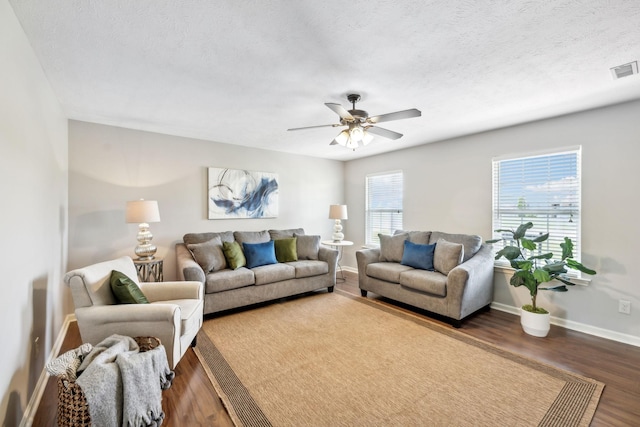 4219 Zephyr Ct, Murfreesboro, TN 37128 - living room featuring dark wood finished floors, ceiling fan, baseboards, and a textured ceiling