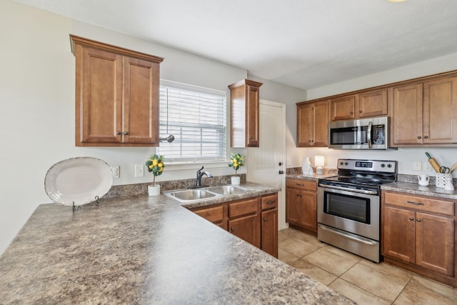 4219 Zephyr Ct, Murfreesboro, TN 37128 - kitchen featuring stainless steel appliances, a sink, and brown cabinets