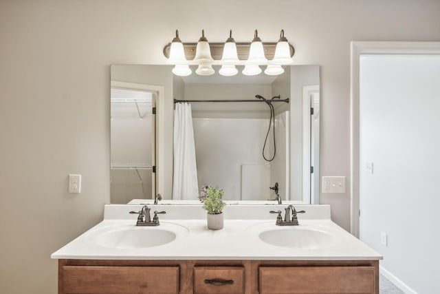 4219 Zephyr Ct, Murfreesboro, TN 37128 - full bathroom featuring double vanity, curtained shower, and a spacious closet