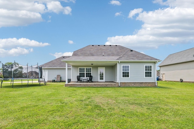 4219 Zephyr Ct, Murfreesboro, TN 37128 - rear view of house featuring a trampoline, a patio, and a lawn
