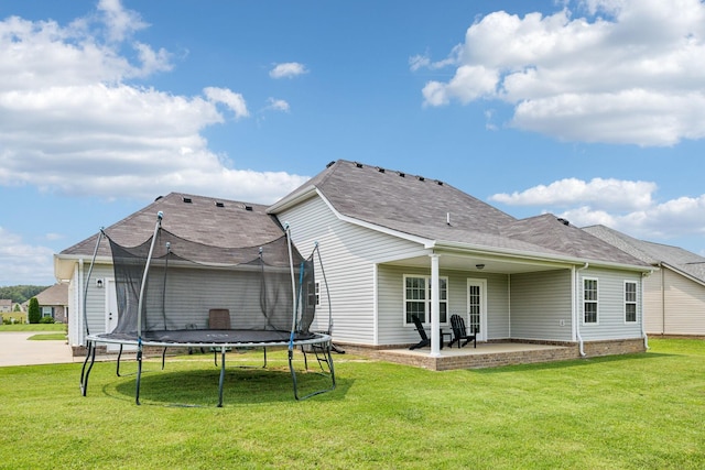 4219 Zephyr Ct, Murfreesboro, TN 37128 - rear view of property featuring a trampoline, a patio, and a lawn