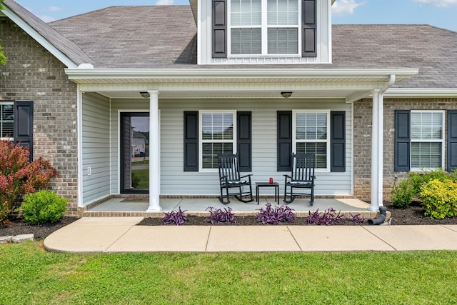 4219 Zephyr Ct, Murfreesboro, TN 37128 - view of exterior entry featuring a porch, brick siding, and roof with shingles
