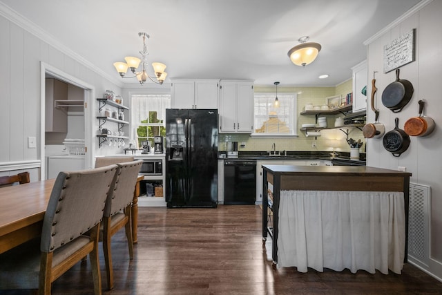 7116 Meadow View Dr, Fairview, TN 37062 - kitchen featuring black appliances, open shelves, dark countertops, a chandelier, and crown molding