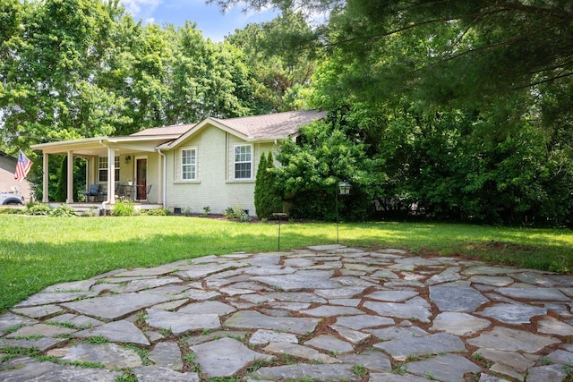 7116 Meadow View Dr, Fairview, TN 37062 - back of house featuring a porch, a lawn, and brick siding