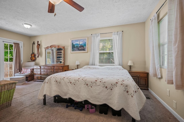 7116 Meadow View Dr, Fairview, TN 37062 - bedroom with a textured ceiling, multiple windows, carpet flooring, and ceiling fan