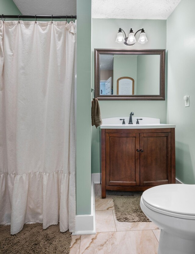 7116 Meadow View Dr, Fairview, TN 37062 - bathroom featuring vanity, a textured ceiling, and a shower with shower curtain