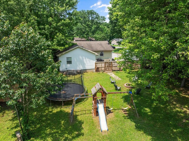 7116 Meadow View Dr, Fairview, TN 37062 - view of green lawn featuring a trampoline and a playground