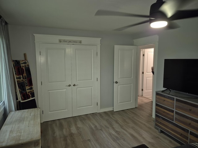 1140 Morriswood Dr, Joelton, TN 37080 - unfurnished bedroom featuring wood finished floors, a ceiling fan, and a closet