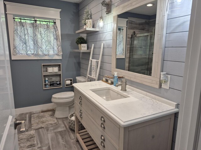 1140 Morriswood Dr, Joelton, TN 37080 - full bathroom featuring toilet, vanity, a stall shower, baseboards, and recessed lighting