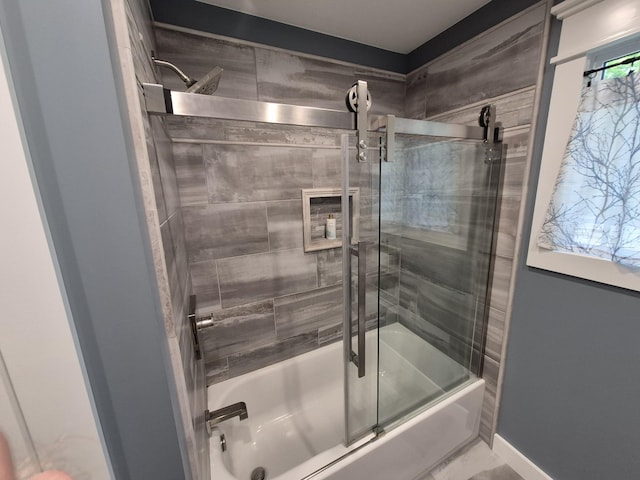 1140 Morriswood Dr, Joelton, TN 37080 - full bathroom featuring shower / bath combination with glass door, baseboards, and marble look tile flooring