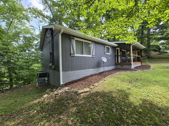1140 Morriswood Dr, Joelton, TN 37080 - view of home's exterior featuring crawl space, cooling unit, a lawn, and a porch
