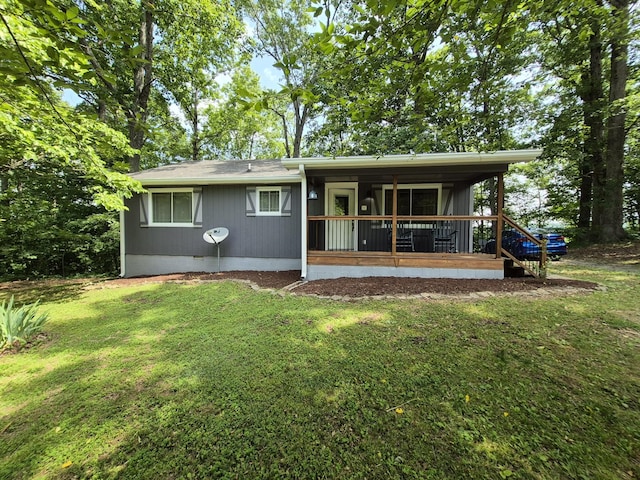 1140 Morriswood Dr, Joelton, TN 37080 - back of house with a lawn, crawl space, and a sunroom