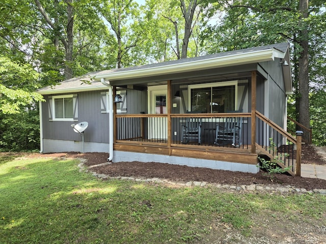 1140 Morriswood Dr, Joelton, TN 37080 - view of front of property featuring a porch and a front lawn