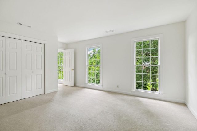 907 Paddock Park, Nashville, TN 37220 - unfurnished bedroom featuring baseboards, carpet floors, and a closet