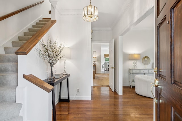907 Paddock Park, Nashville, TN 37220 - entryway with stairway, dark wood-style floors, a chandelier, baseboards, and crown molding