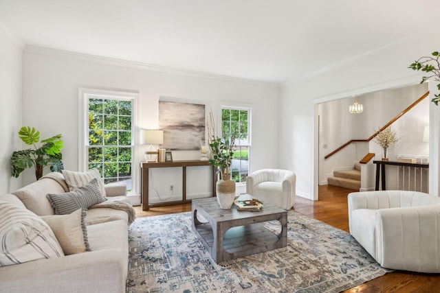907 Paddock Park, Nashville, TN 37220 - living area with stairway, ornamental molding, healthy amount of natural light, wood finished floors, and baseboards